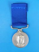 A Rhodesian District Service Medal awarded to D.A Chikaniso. E.