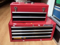 A four-drawer ball bearing roller tool cabinet together with another with two drawers and lift-up