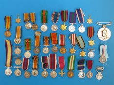 A collection of miniature medals, from King's South Africa medal to Elizabeth II,