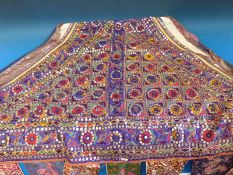 A possibly Indian triangular sequinned shawl