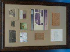 A framed display relating to the Red Baron, comprising a piece of aircraft fabric,