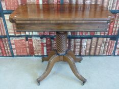 A Regency mahogany fold over card table,