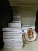 Fifty one miniature Goebel Hummel plates with various dates (boxed)