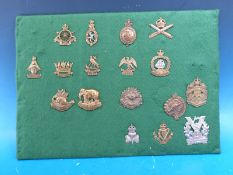 Seventeen various British Army cap badges including WW1 Army Cyclists, Australasian, British Africa,