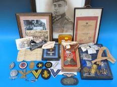 A quantity of mainly replica Nazi German military badges including Iron Crosses, Luftwaffe,