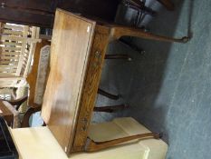 A light oak hall table raised on cabriole legs (H76 x W75 x D48cm)