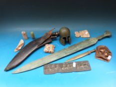 A quantity of Eastern and similar items including some replica items,