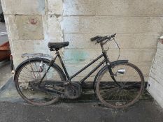 A black vintage ladies bicycle