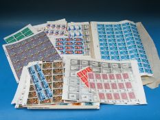 A large quantity of pre-decimalisation mint QEII GB sheets of stamps