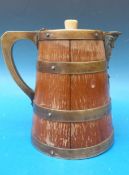 A late 19thC coopered brass bound jug with ceramic liner
