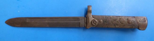 A WW1 folding Halian bayonet, blade approximately 19cm, wooden handle slabs, fullered blade,