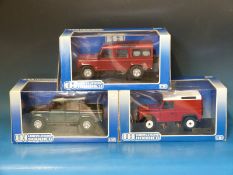 Three Universal Hobbies 1:18 scale diecast model Land Rovers (all in original boxes)