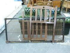 An Arts and Crafts oak single bed