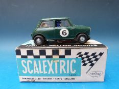 Tri-ang Scalextric model Mini Cooper in British racing green, C/76, in original box.