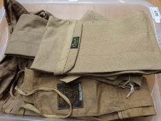 A quantity of vintage canvas fishing rod sleeves including Hardy,