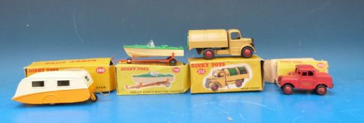 Four Dinky toys diecast model vehicles, Caravan 190, Refuse Wagon 252,