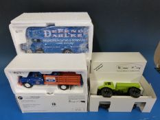 Three diecast model trucks, First Gear 1:34 scale 1957 International R-200 with moving van,