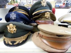 A quantity of US Military Corps and other headgear, mainly Army,