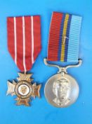 A Rhodesian General Service Medal and bronze cross awarded to 725082 CPL T. Hodgson.