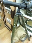 A cased Canadian Kodak 7x50 gun sighting telescope together with aluminium tripod mount in canvas