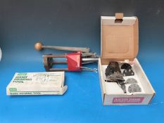 A Lee Turret press kit together with a hand priming tool and an auto disk powder measure (all in