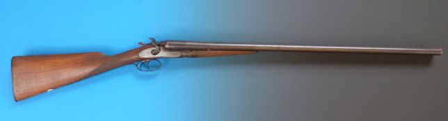 A Charles Osborne 12 bore double barrelled side by side hammer action shotgun,