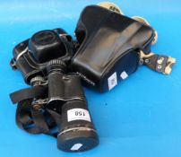 A Nikon camera and lens,