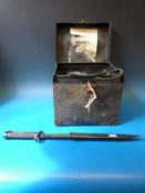 A Grimes signalling lamp (in case) and a German WWII bayonet in sheath
