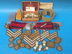 A quantity of cWW2 era military badges,
