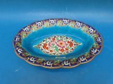 An oval Longwy bowl with enamel decoration