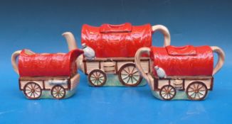 A 1930's wagon train tea set comprising teapot,