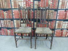 A pair of rush seated oak chairs