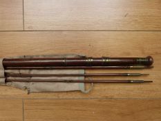 A trout fly rod, three-piece with spare tip sections Reg No 6648 (total length approximately 11ft),