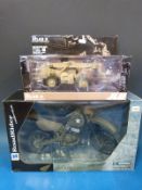 Three diecast model military vehicles, a JLG Attacus 11 telehandler,