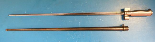 A post 1915 era French stick bayonet (with no guillon) 52cm quadrangular blade in metal scabbard.