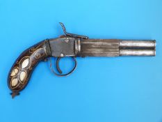 A Turkish over and under percussion pistol with mother of pearl and brass wirework inlay to the