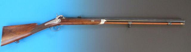 A 20 bore single barrel percussion target rifle with adjustable trigger,