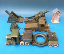 A selection of military diecast models and figures to include field guns,