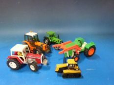 A collection of various loose diecast model vehicles