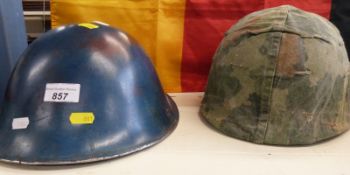 A West German military helmet, West German flag,