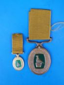 A Rhodesian badge of honour with citation awarded to District Security assistant Tendayi Musengezi.