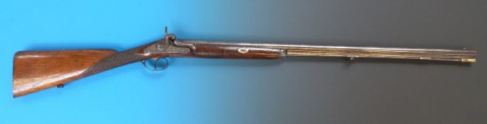 A small calibre single barrel smooth bore musket with London stamped to barrel