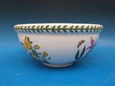 A Portmeirion mixing or fruit bowl with blue passion flower decoration