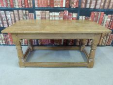 A refectory style oak coffee table (L107 x D54 x H50cm)