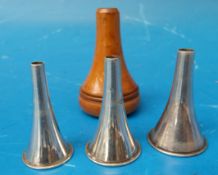 A boxwood cased set of three auriscope speculae, possibly white metal,