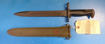 A WWII 1944 M1 bayonet by The Utica Cutlery Company U S in scabbard