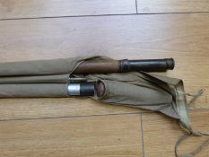 A Farlow and Co cane fishing rod with two top crops in metal tube and separate screw in butt