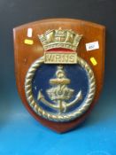 A WRNS brass tampion Naval crest on wooden plaque (height 37cm)