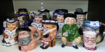 A collection of Toby jugs including Doulton Beefeater and Falstaff,