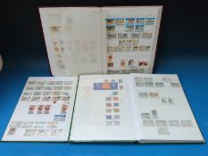 Three albums of Isle of Man and Channel Island stamps